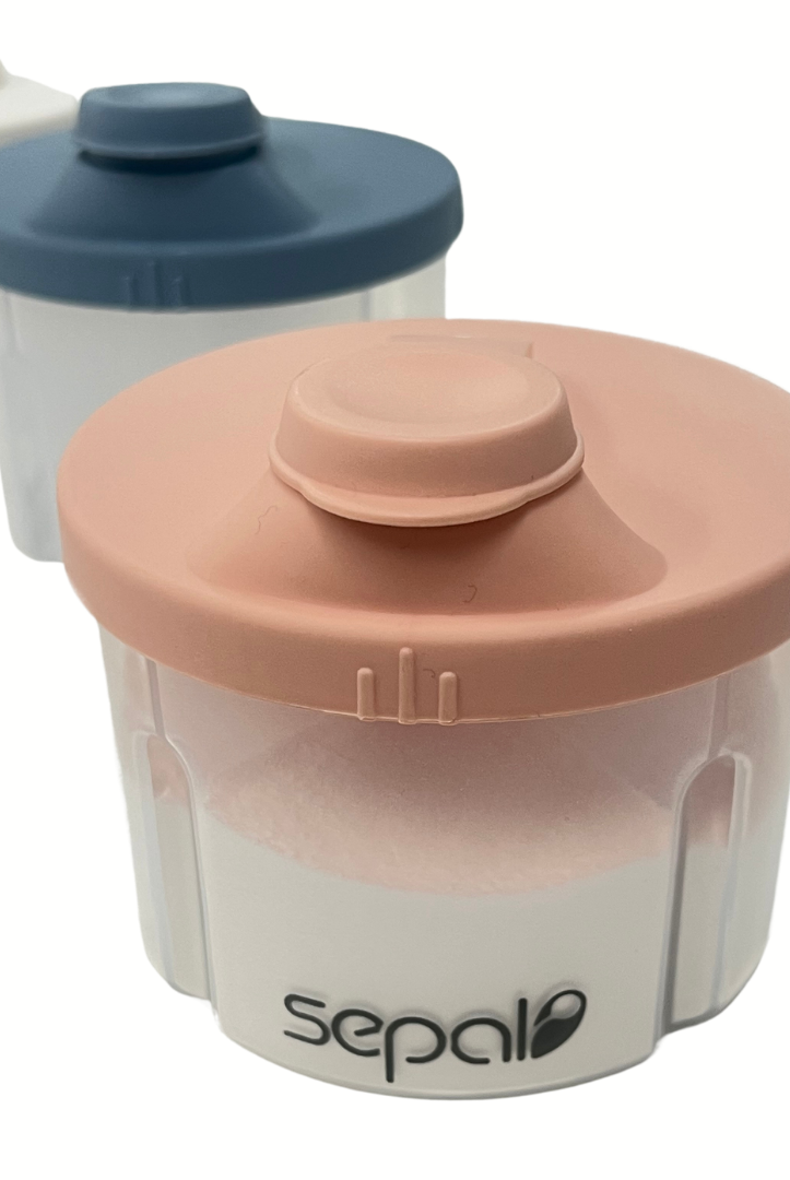 Two baby formula containers with lids on a white background, featuring the brand 'sepal'.