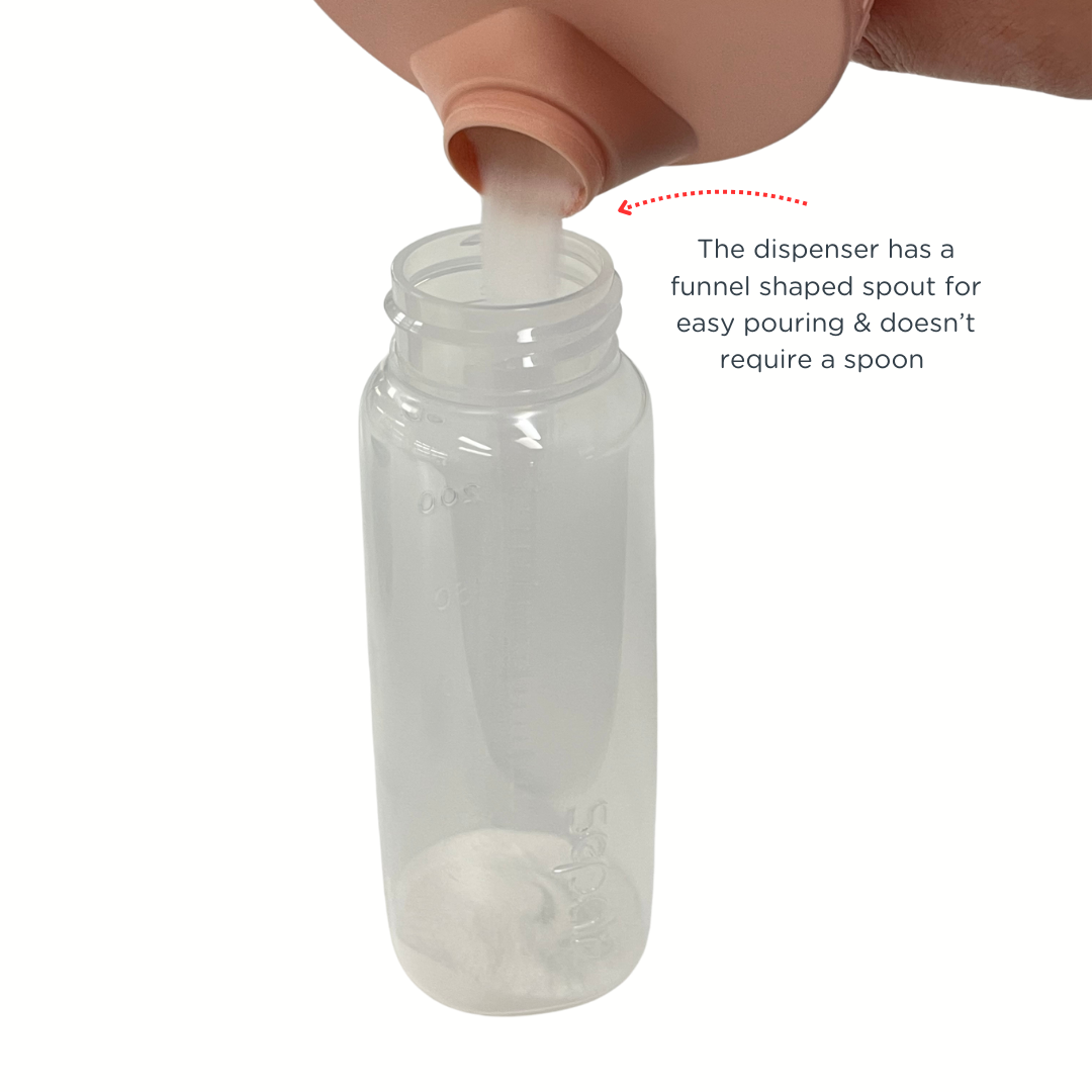 Clear plastic bottle with a funnel-shaped spout being used to pour a white substance.