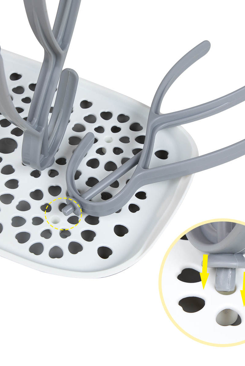 Sepal bottle & teat drying rack for a focus on the holes where the blades slot in.