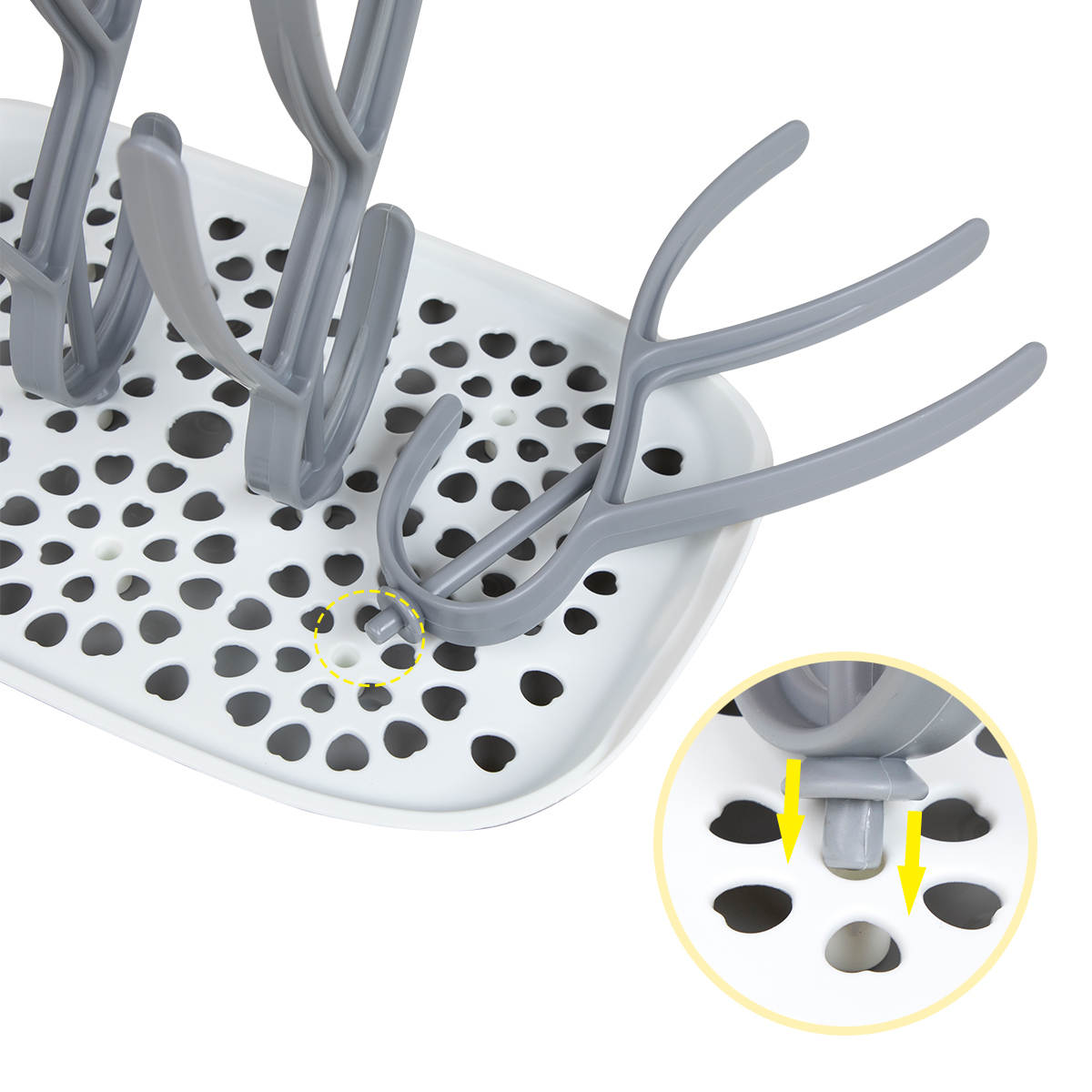 Sepal bottle & teat drying rack for a focus on the holes where the blades slot in.