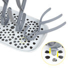 Sepal bottle & teat drying rack for a focus on the holes where the blades slot in.