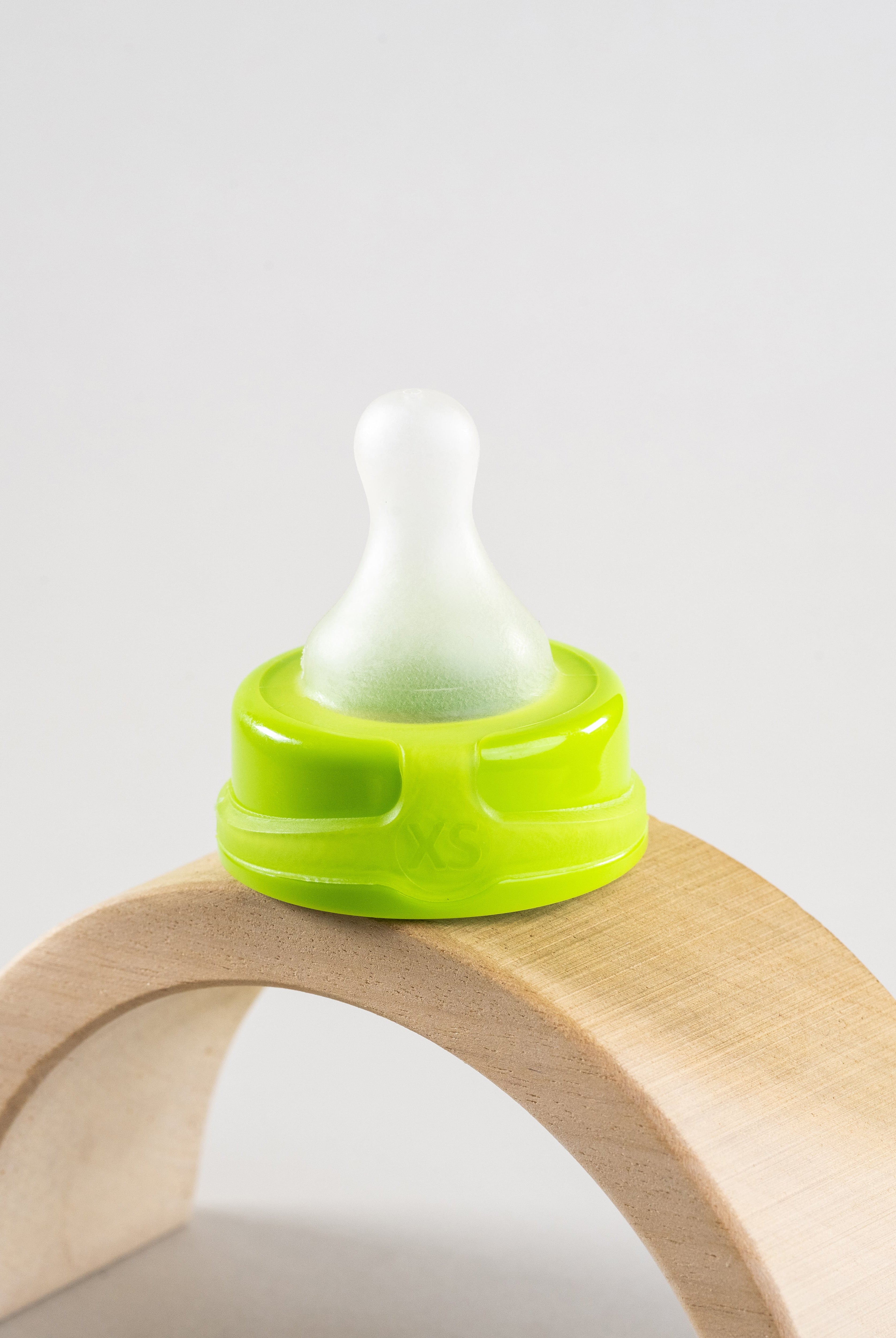 Sepal green extra small teat slow flow. Displayed on a wooden arch.