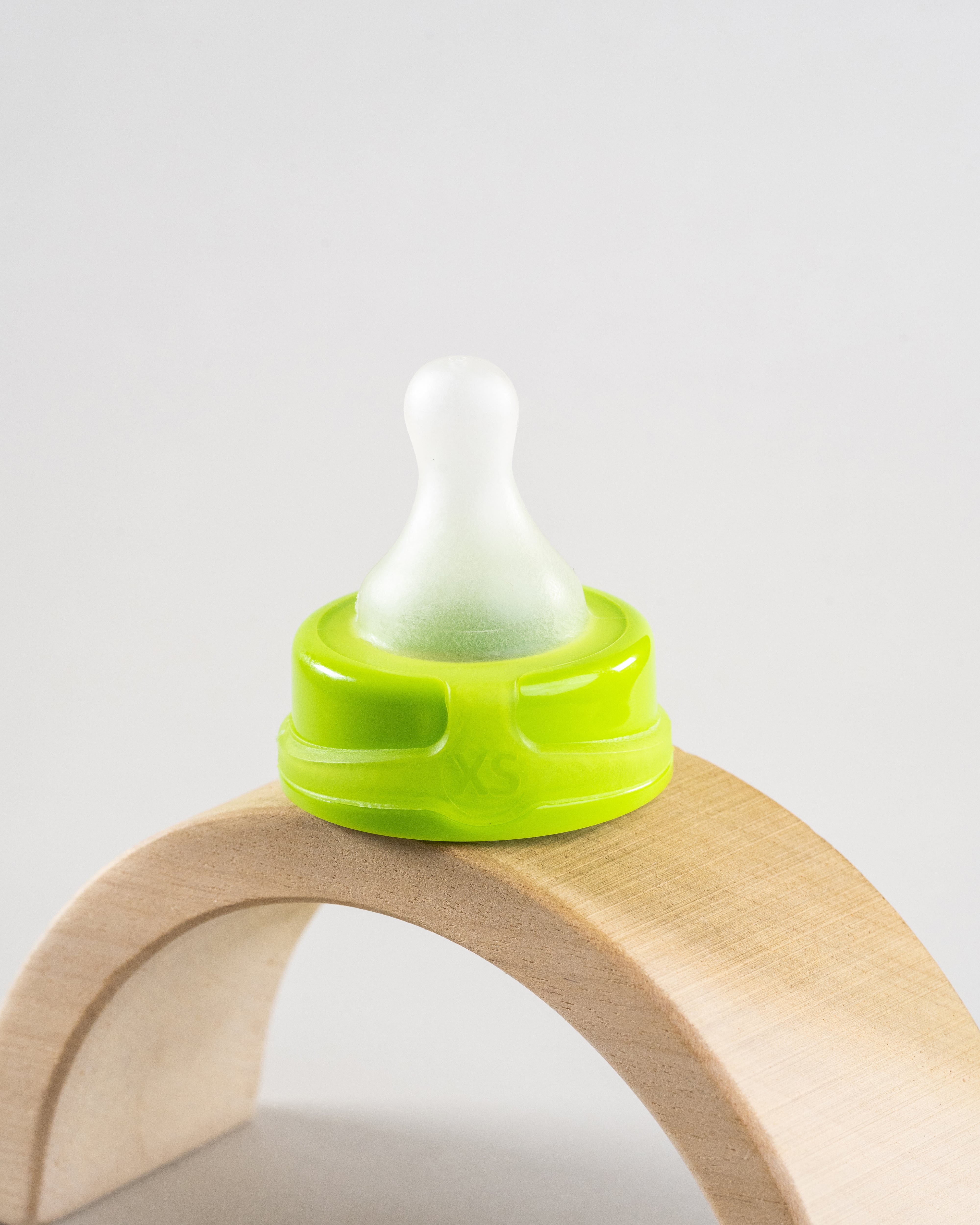 Sepal green extra small teat slow flow. Displayed on a wooden arch.