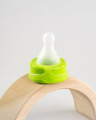 Sepal green small teat slow flow displayed on wooden arch.