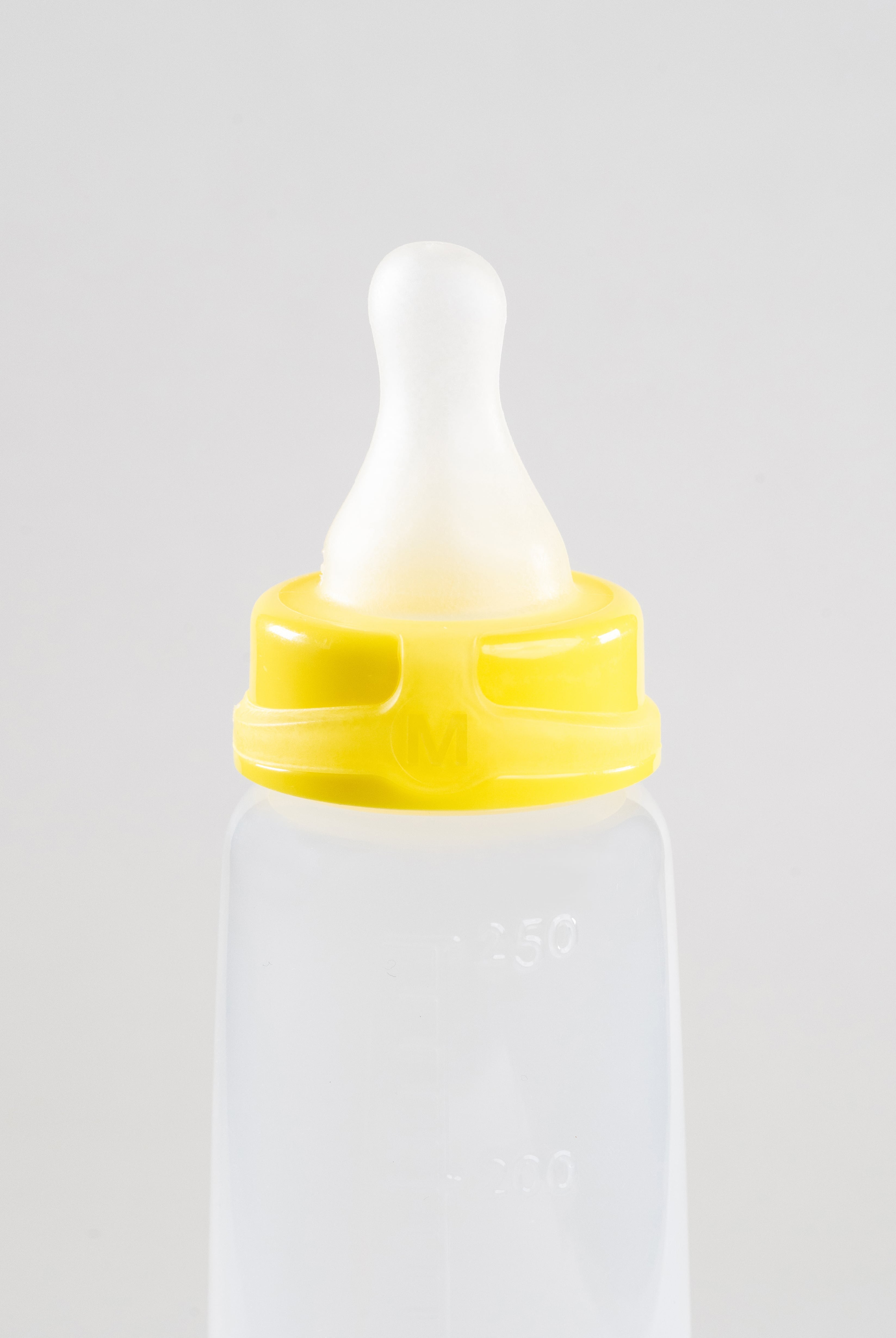 250ml Sepal baby bottle with yellow medium teat medium flow attached.