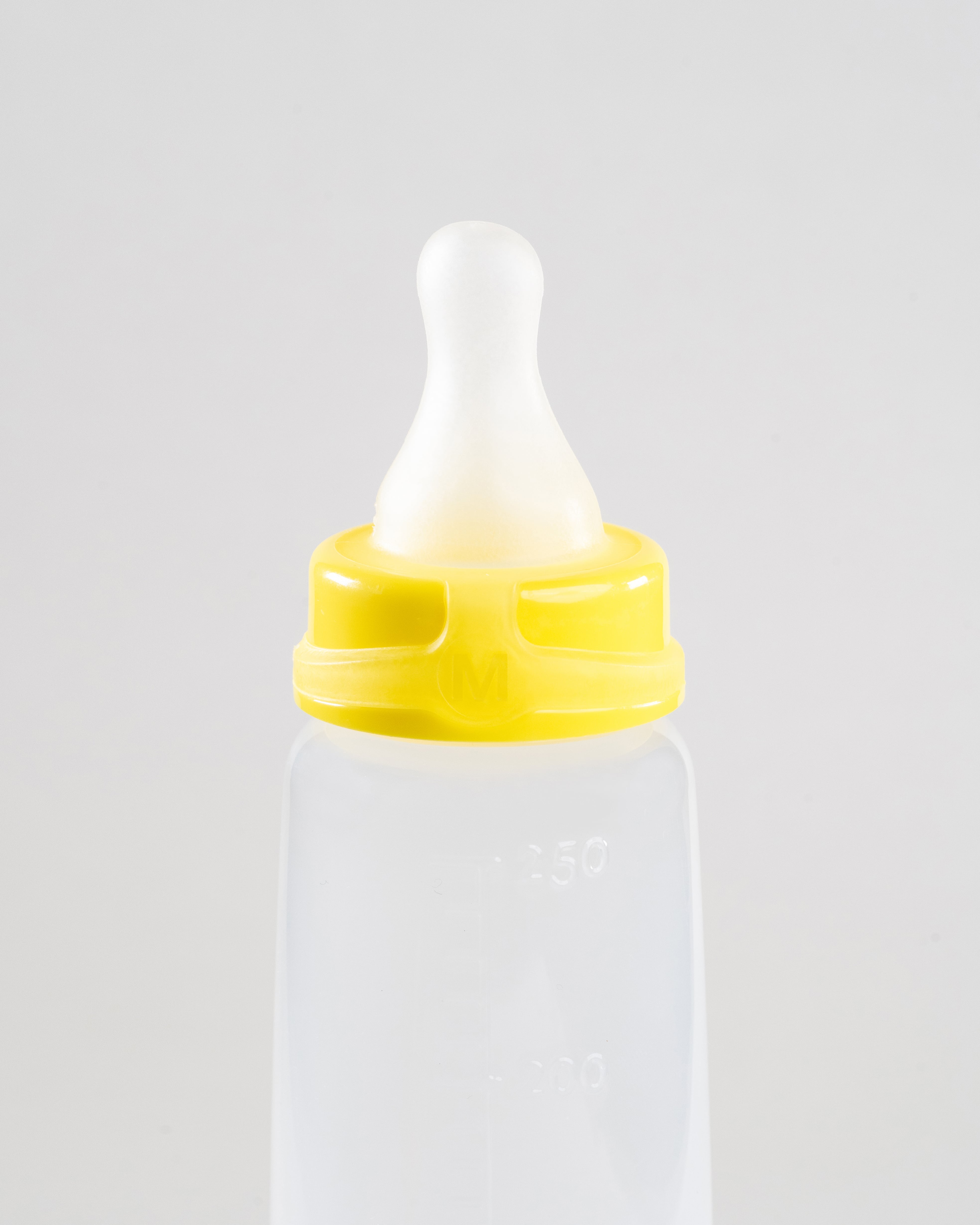 250ml Sepal baby bottle with yellow medium teat medium flow attached.