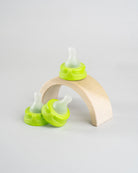 3 Sepal green extra small slow flow teats. Displayed on a wooden arch.