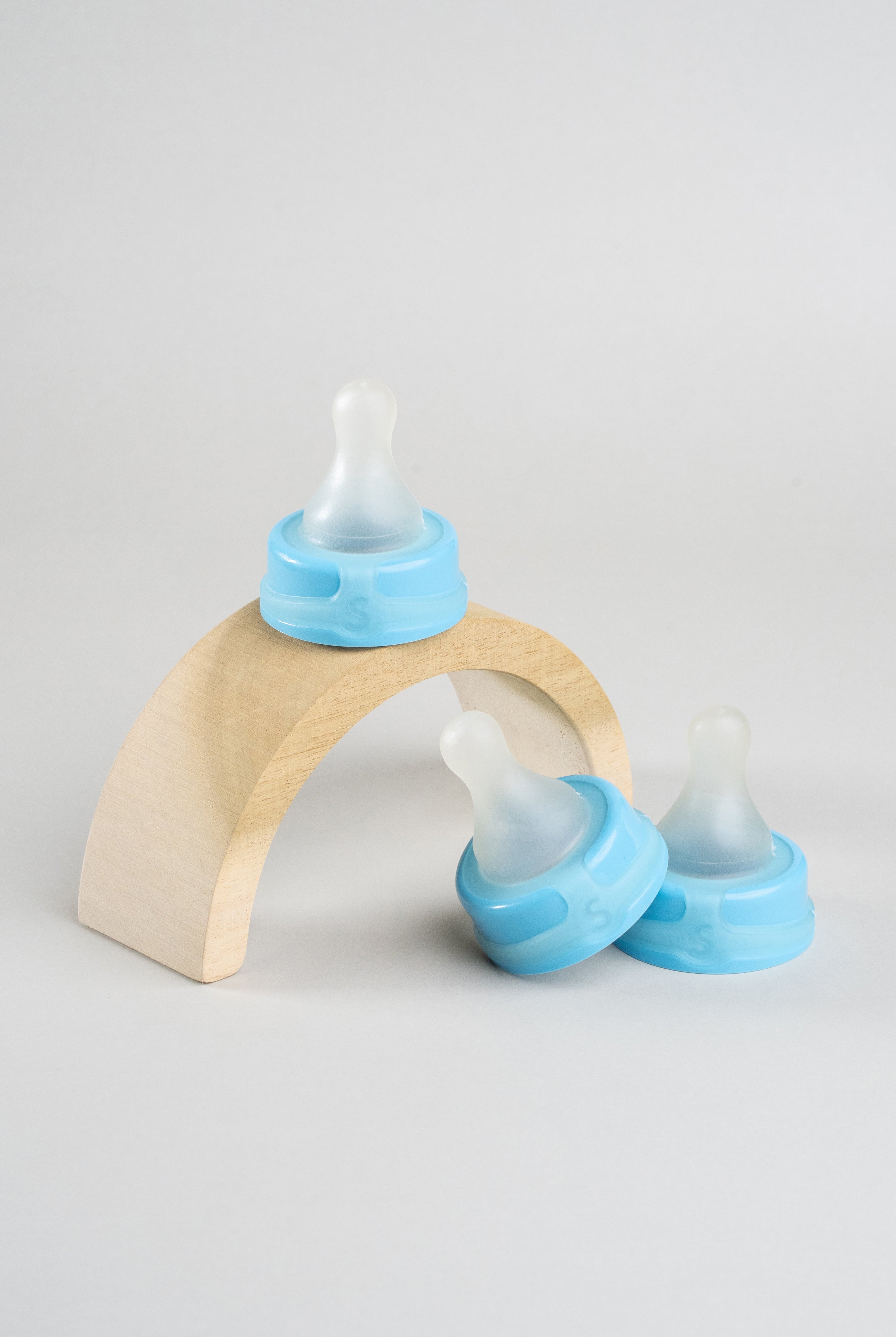3 Sepal blue small teat extra slow flow displayed on a wooden arch