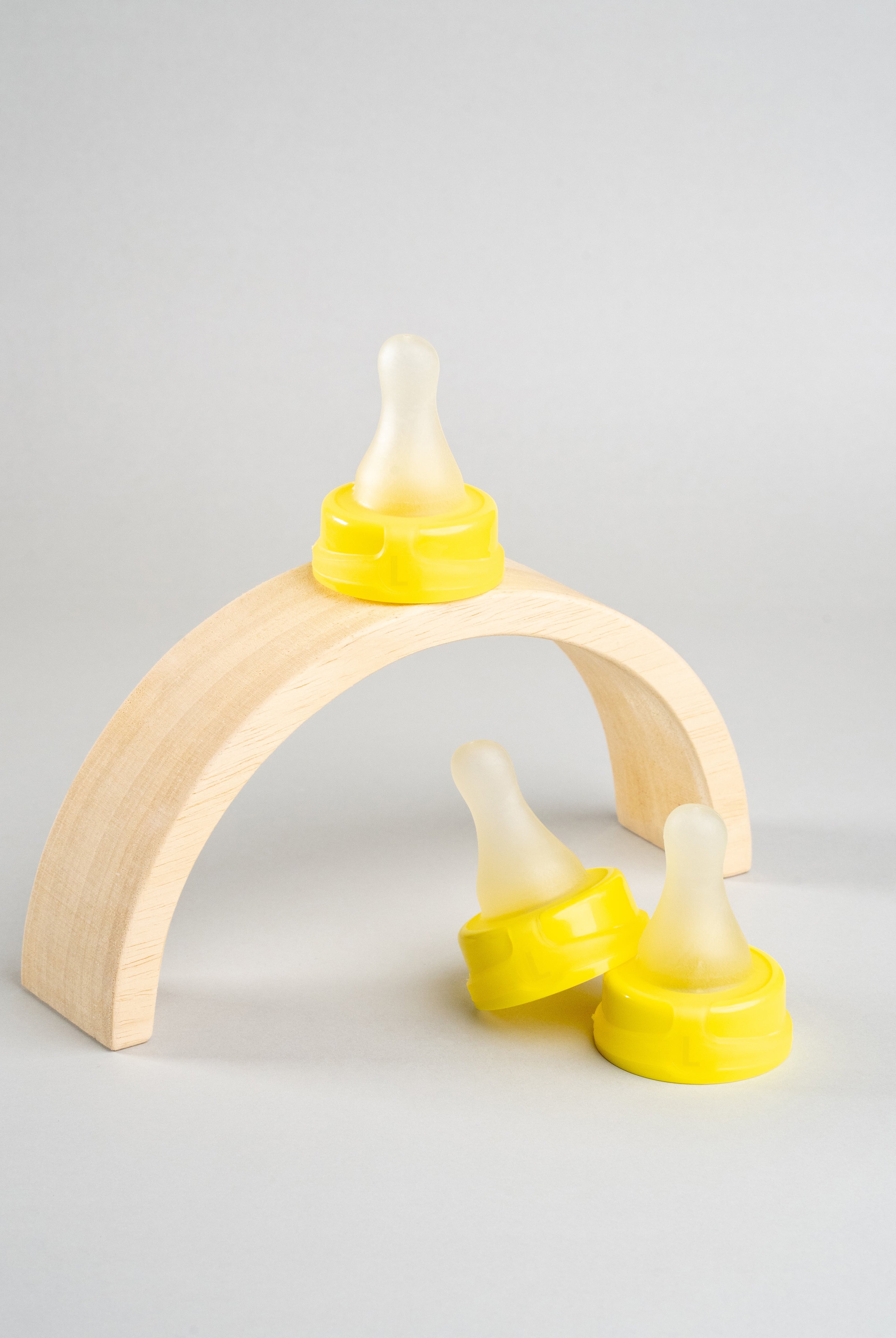 3 Sepal yellow large teat fast flow displayed on a wooden arch