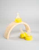 3 Sepal yellow large teat fast flow displayed on a wooden arch